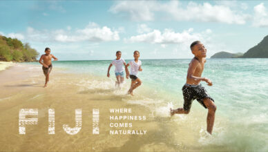 Tourism Fiji_A group of local school children play on the beach in the Yasawa Islands