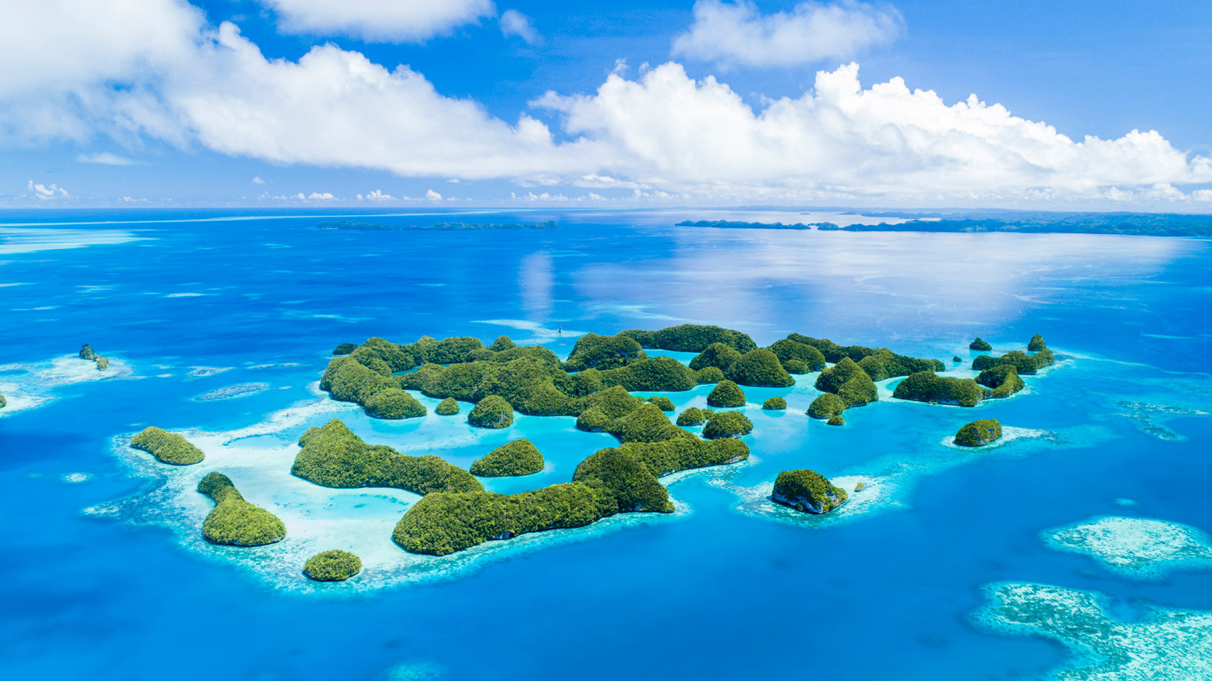 DISCOVER PALAU, ONE OF THE WORLD’S LAST REMAINING FRONTIERS, WITH FOUR